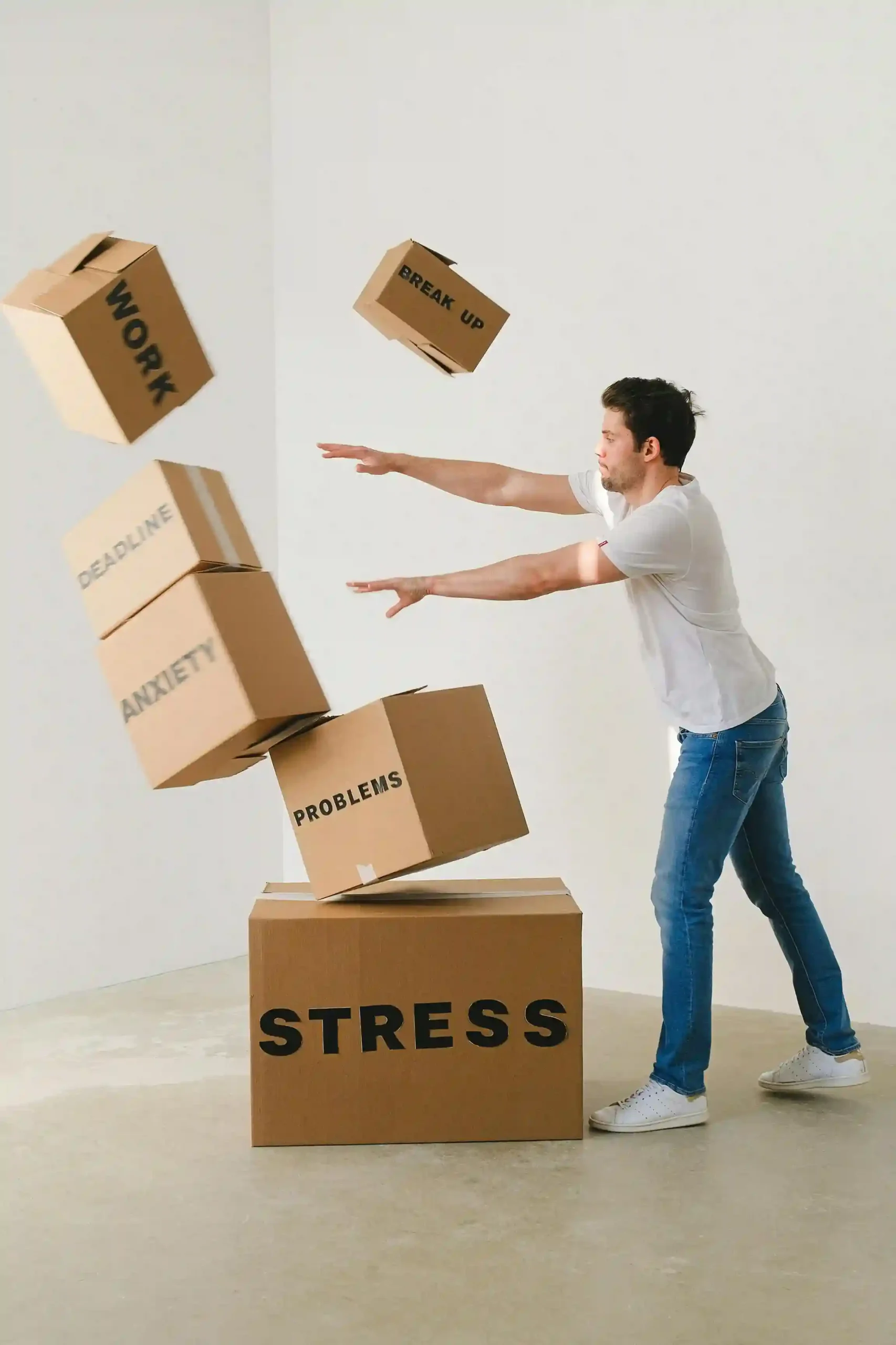 man with anxiety working under stress at work and other life problems