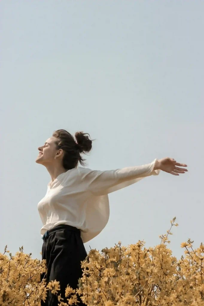 Cheerful girl got relief from depression and showing her happy and jolly side 