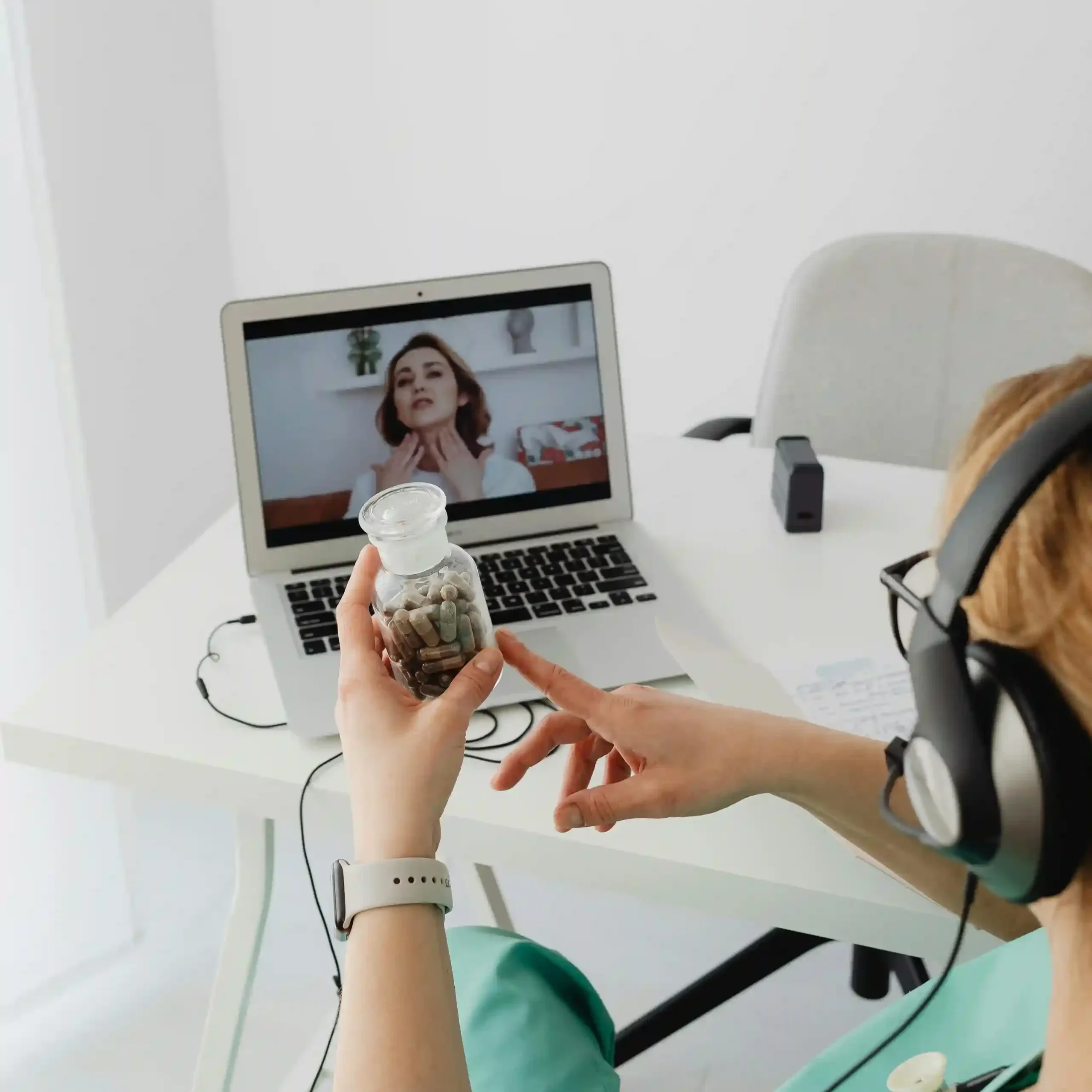female patient consulting a licensed psychiatric care provider through telepsychiatry for treatment and medication management